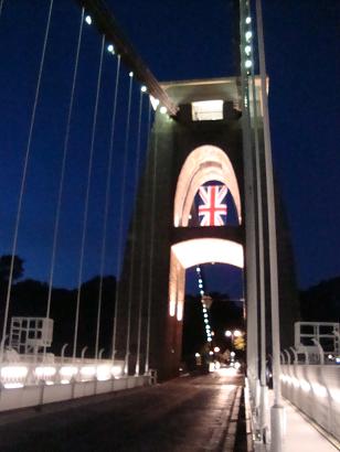 Suspension bridge adorned with flag